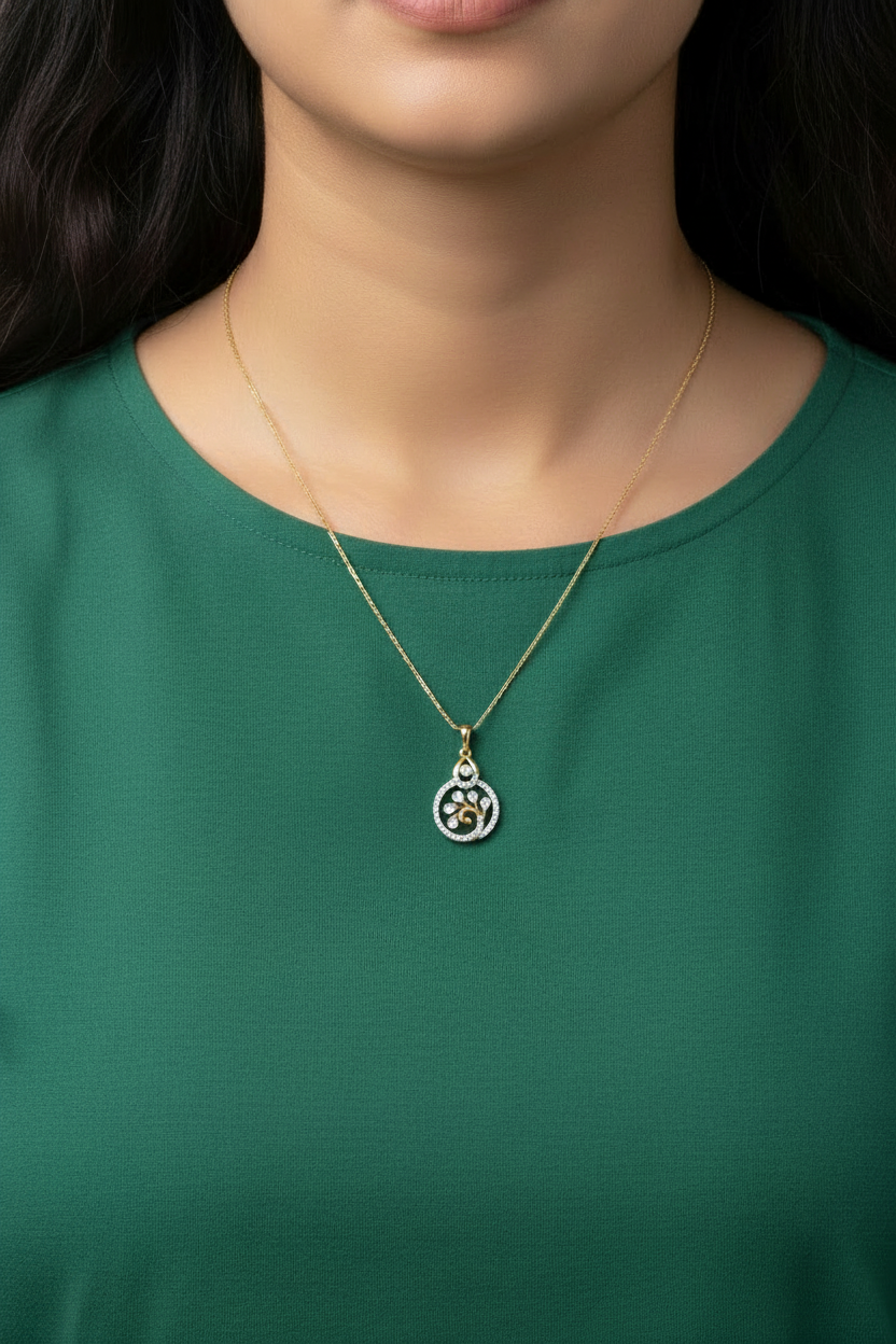 Girl wearing green V-neck top with small CPS00259 yellow gold circular floral swirl pendant