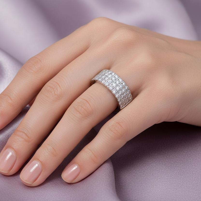 Model hand wearing diamond pave band