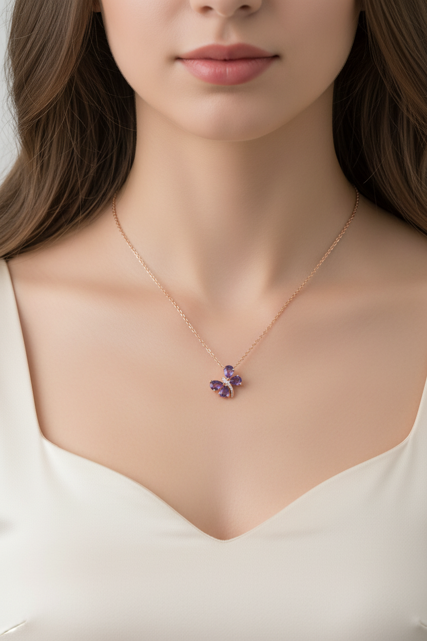 Model wearing butterfly pendant necklace