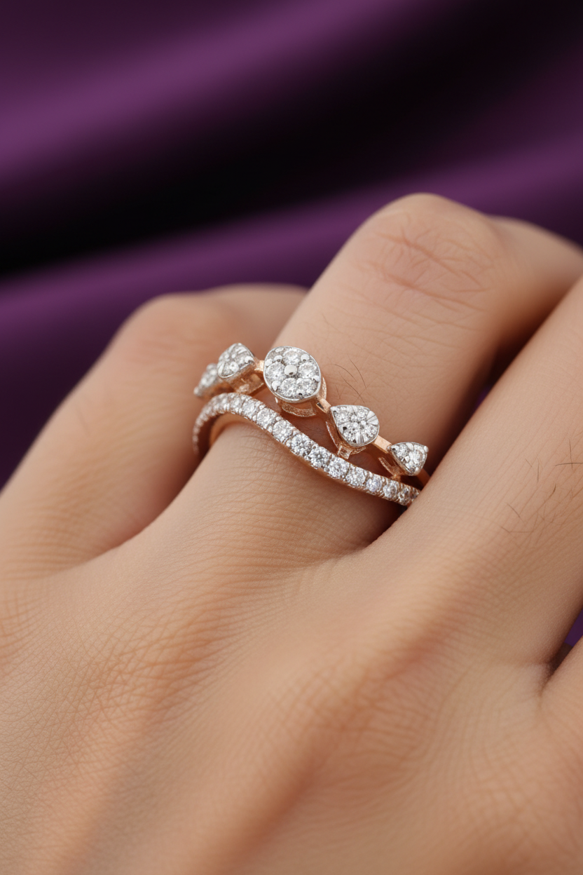 One finger close-up with rose gold floating diamond cluster ring
