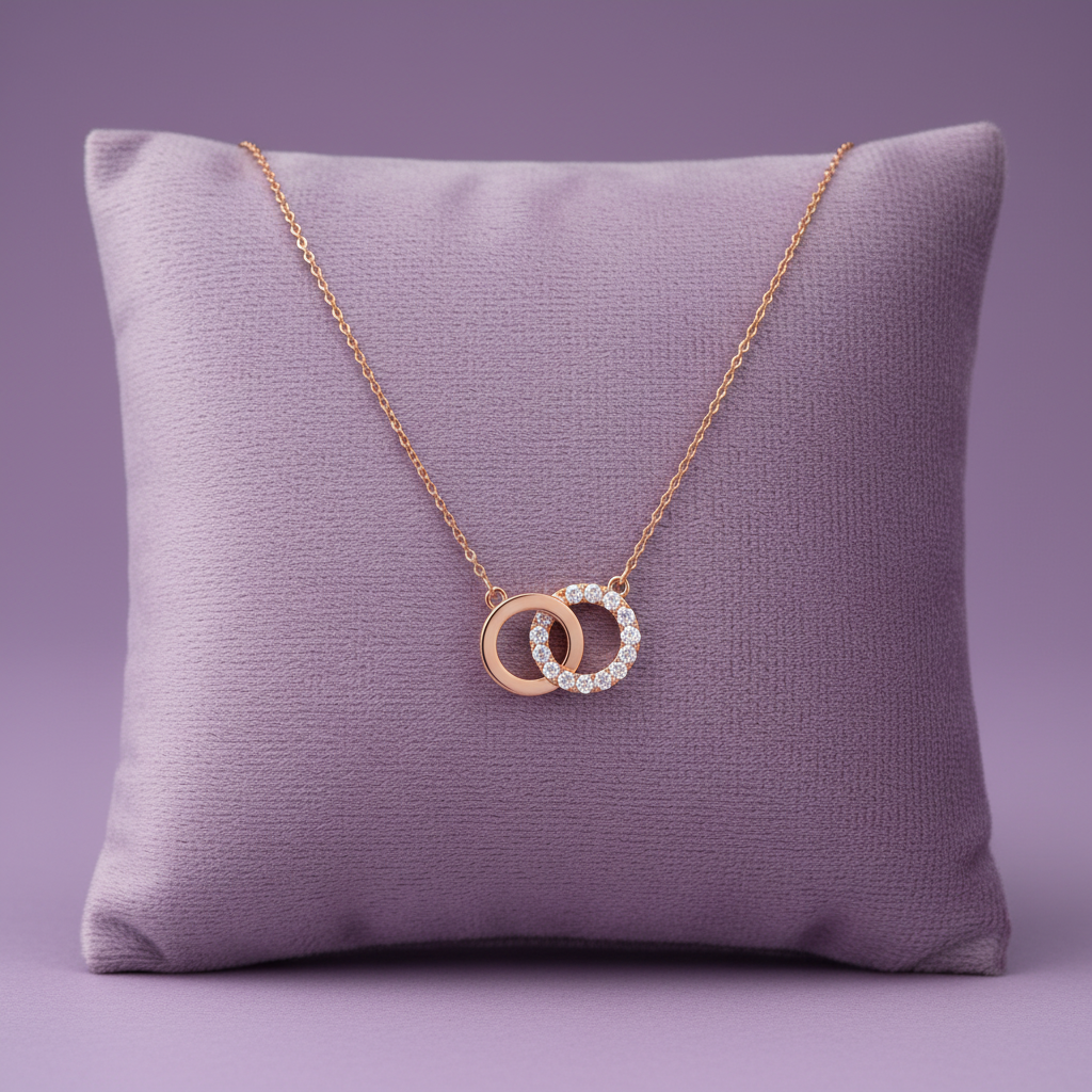 Rose gold interlocking circles diamond pendant necklace on lavender velvet cushion