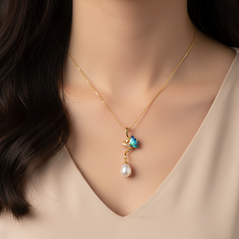 Woman wearing CPD00215 yellow gold blue-green enamel lotus butterfly pearl drop pendant at collarbone