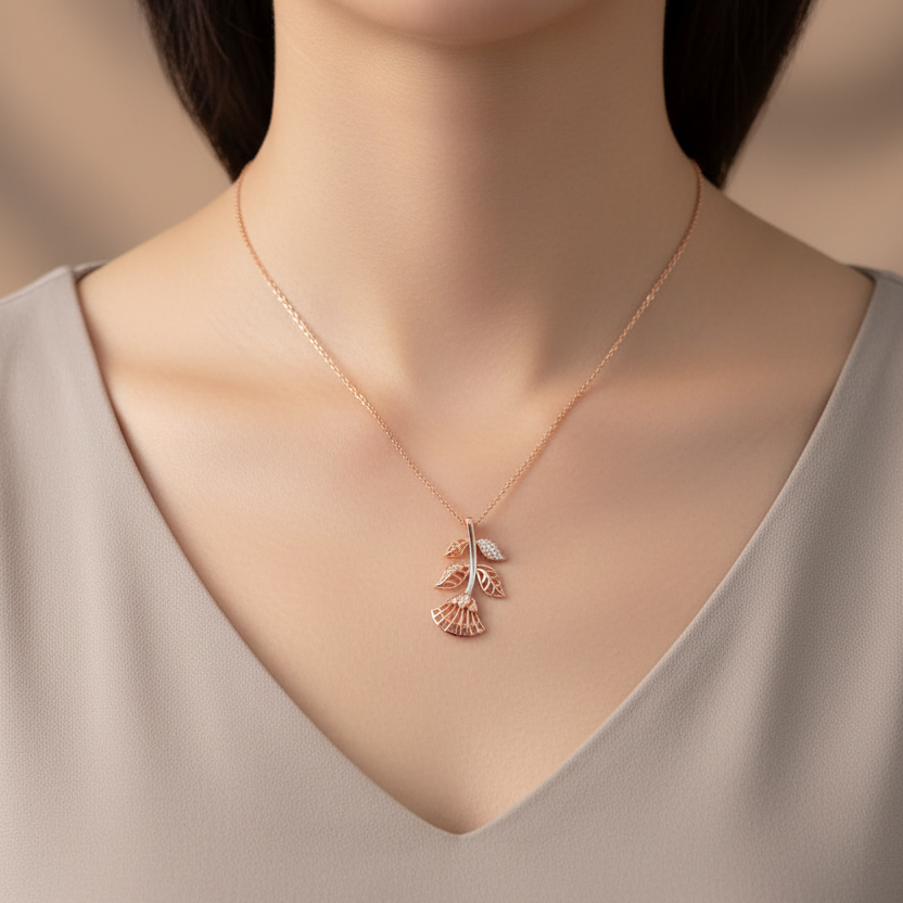 Woman wearing extra small CPD00265 rose gold botanical leaf branch pendant full upper body wide shot