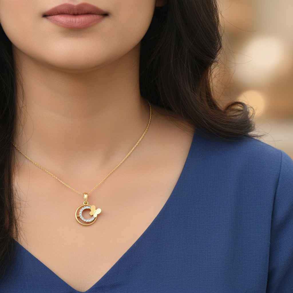 Zoomed close-up of tiny yellow gold butterfly circle diamond pendant on Indian woman's neck